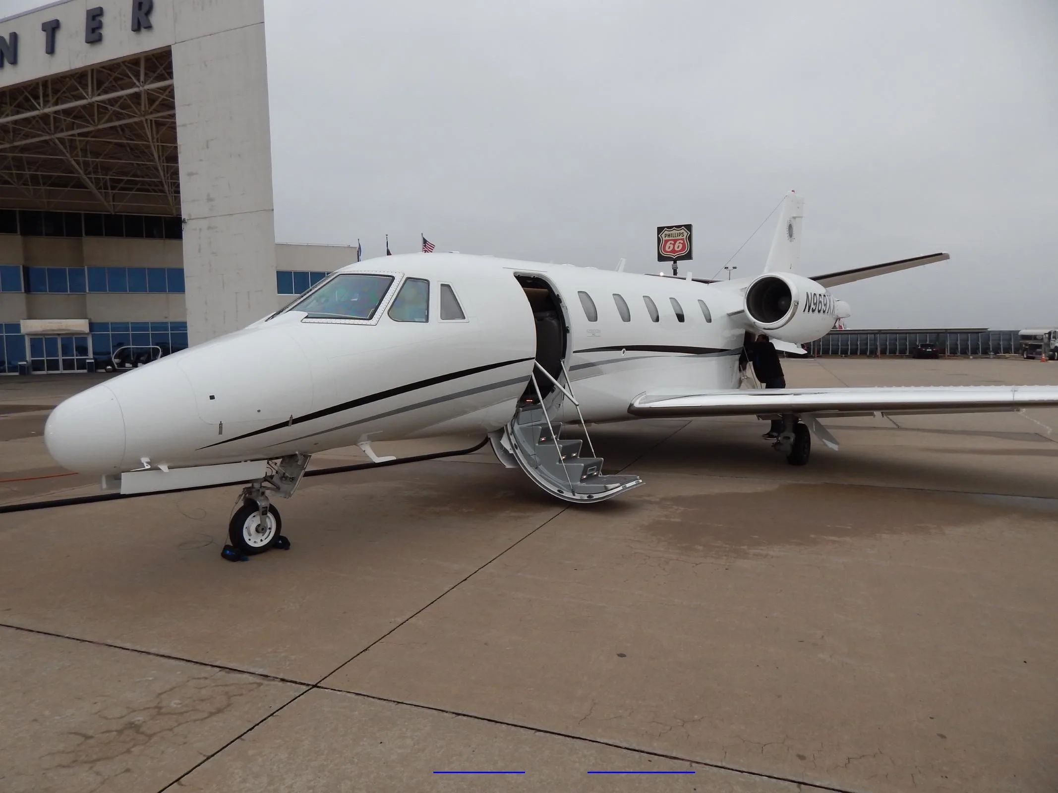 Cessna Citation CJ3 N969XX on the ramp with open airstair.