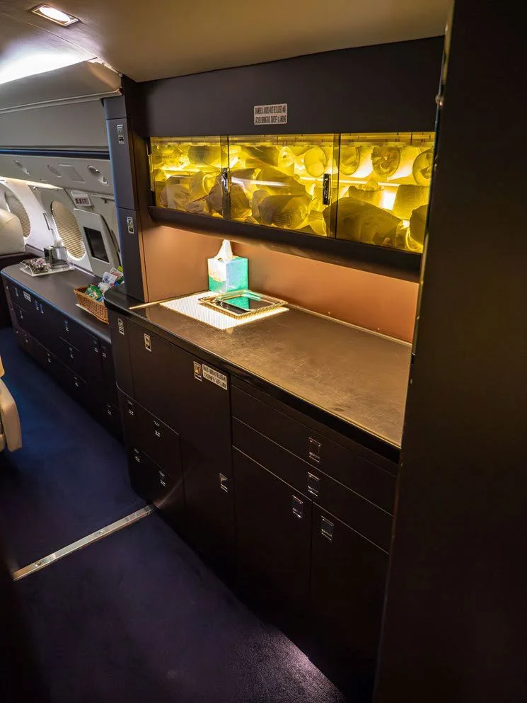 Galley area with sink and storage.