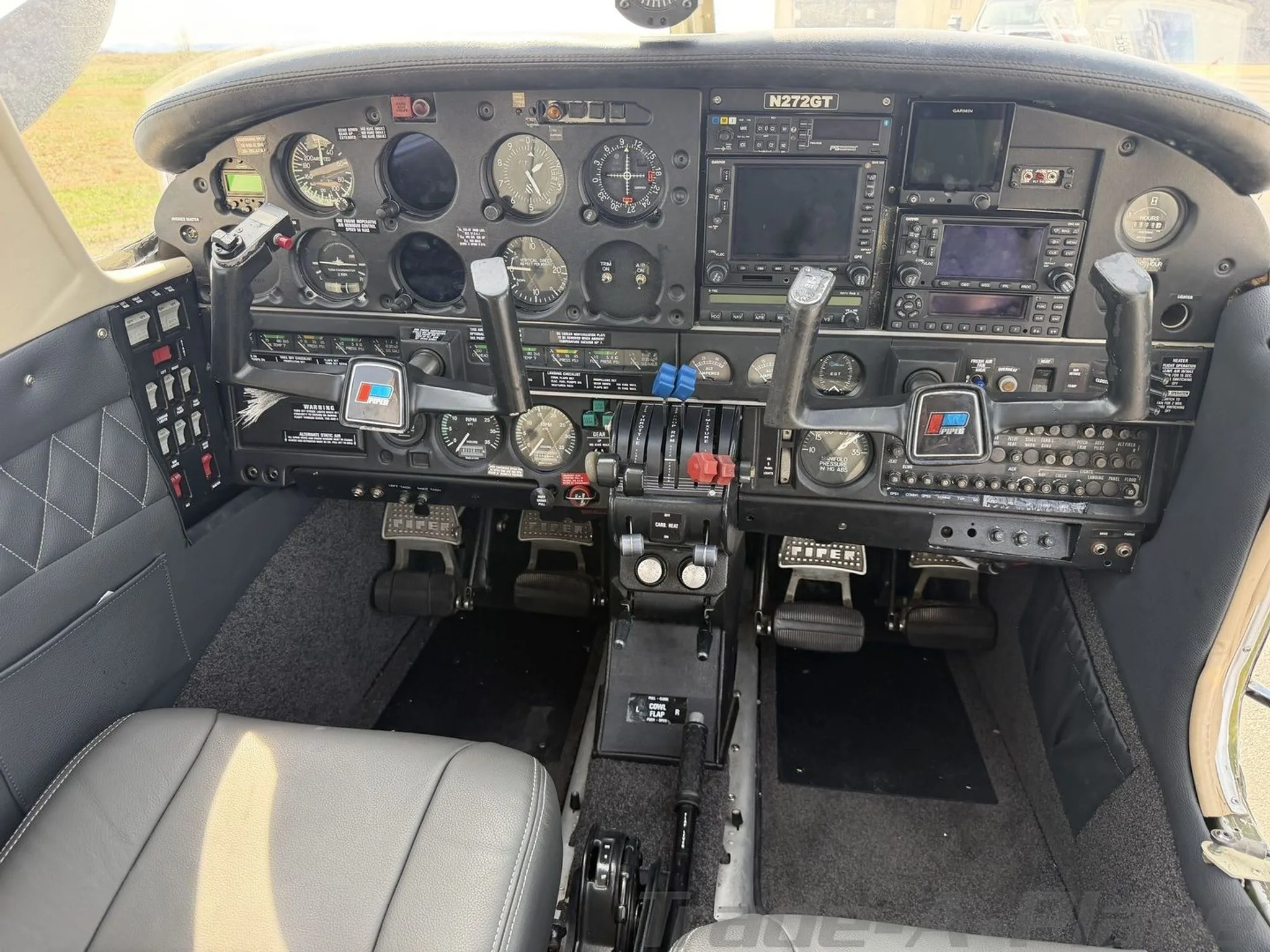 The instrument panel of the aircraft cockpit.