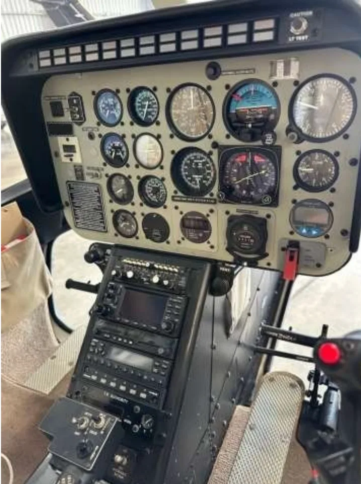 Cockpit view of the Bell 206L-4 showing instrument panel.