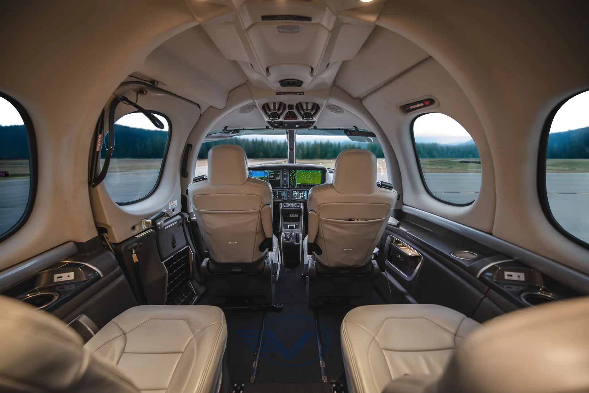 View of the cockpit and cabin of a Cirrus Vision Jet.