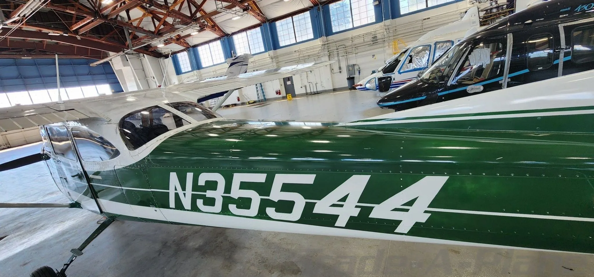 Another angle of the Cessna 172 showcasing its side.