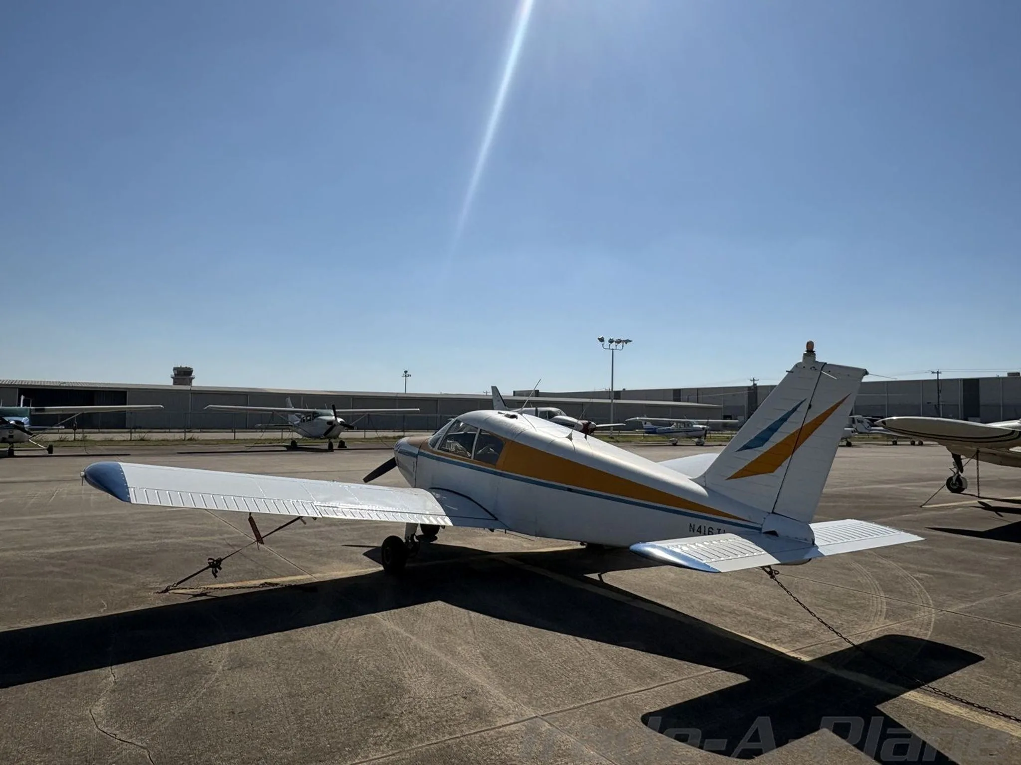 A rear view of the aircraft with a clear sky.