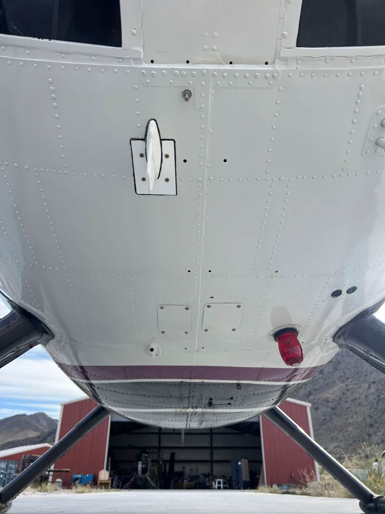 Underside view of the McDonnell Douglas 500C helicopter.