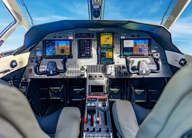 The cockpit of the Pilatus PC-12 aircraft features advanced avionics and controls.