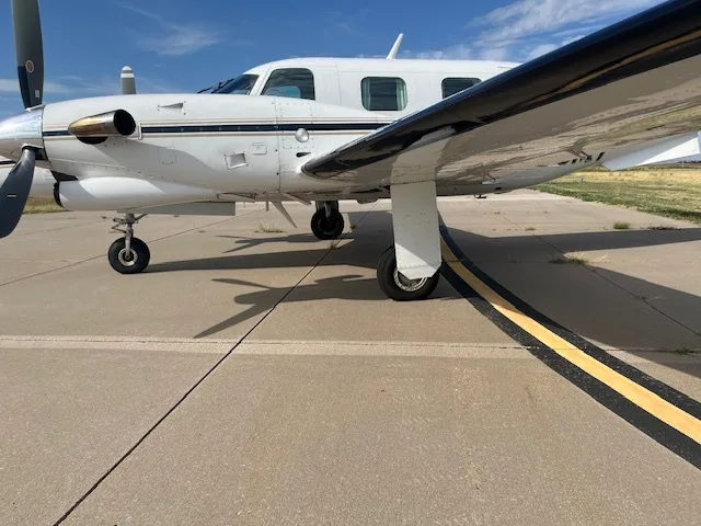 A close-up view of the Piper Cheyenne I's landing gear.