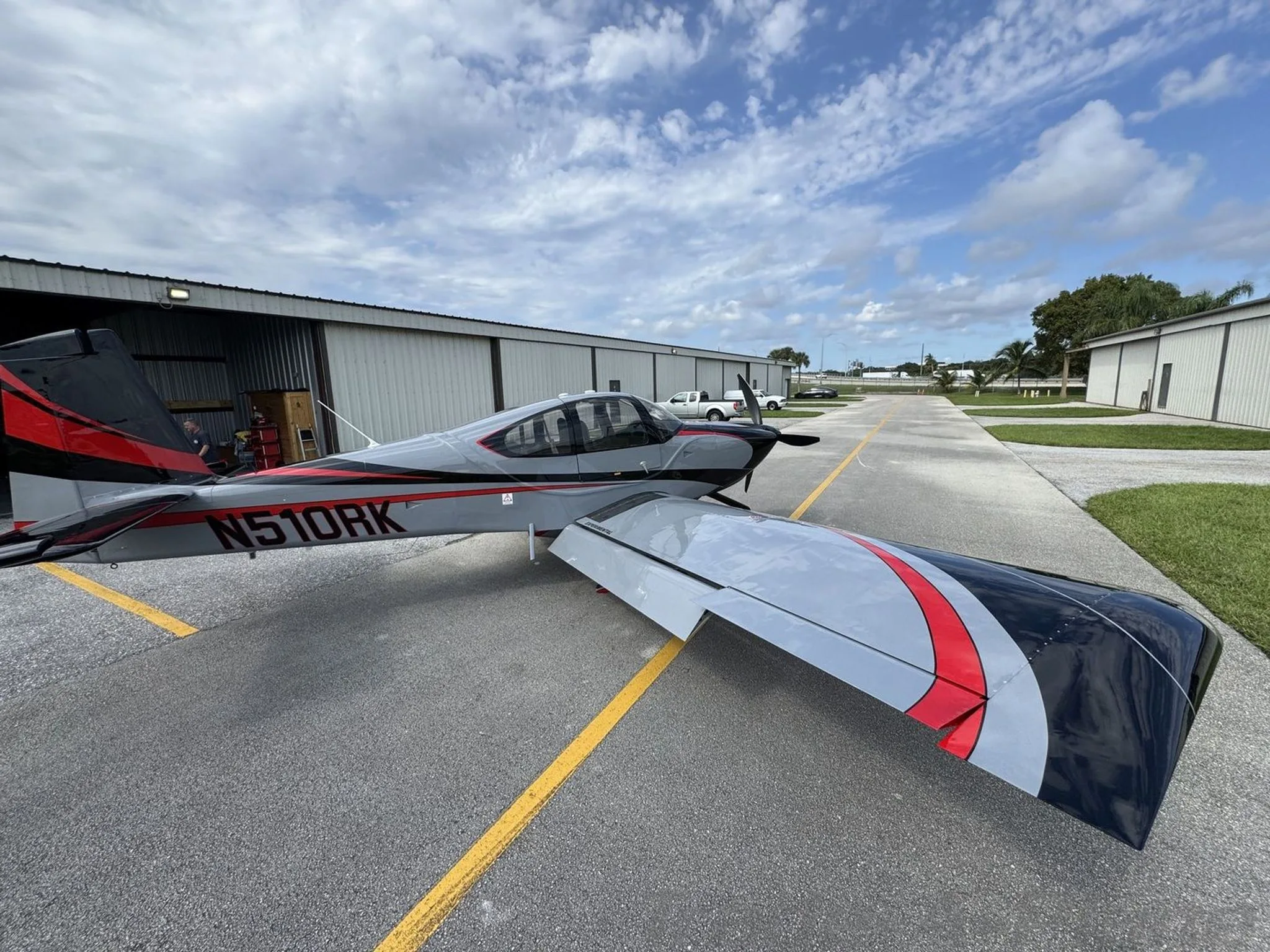 Rear view of the aircraft highlighting its tail and wing.