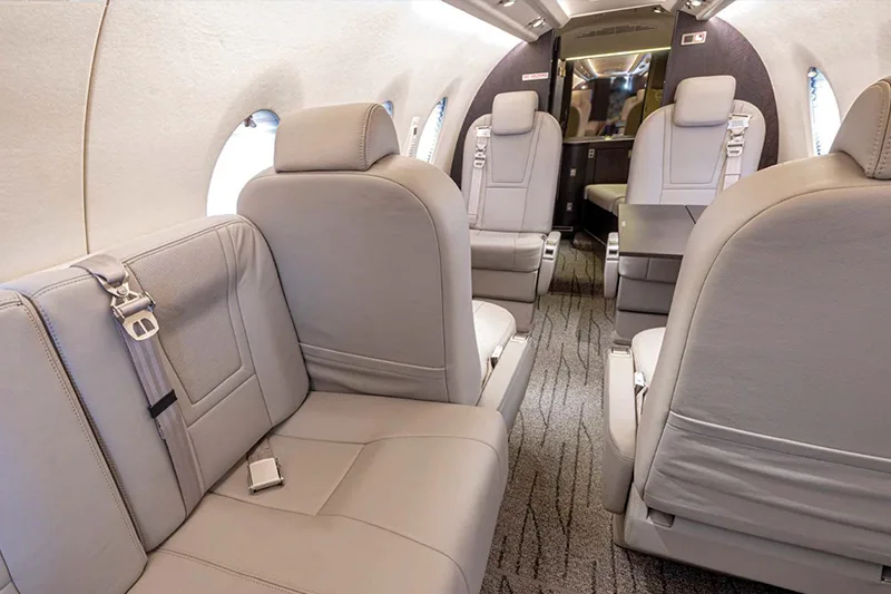 Interior view of the Nextant 400XTi cabin showing the leather seating arrangement.
