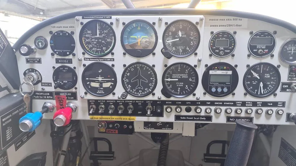 The instrument panel of the Aviat Aircraft Husky A-1C, showing various gauges, switches, and controls.