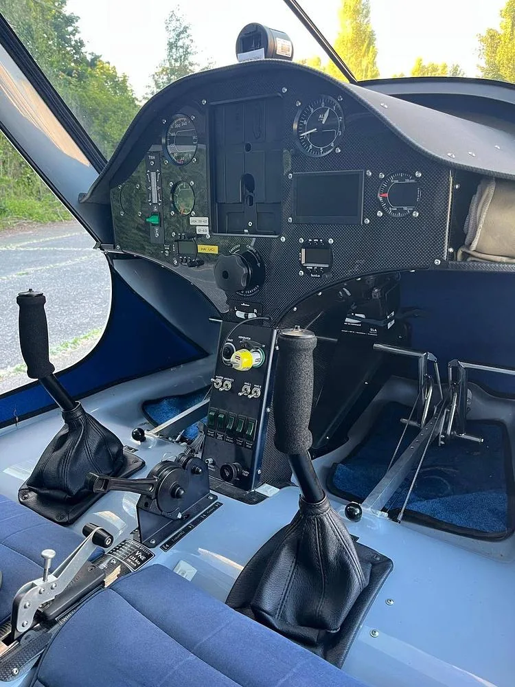 Close-up view of an Alpha Light Sport aircraft's instrument panel and central controls.