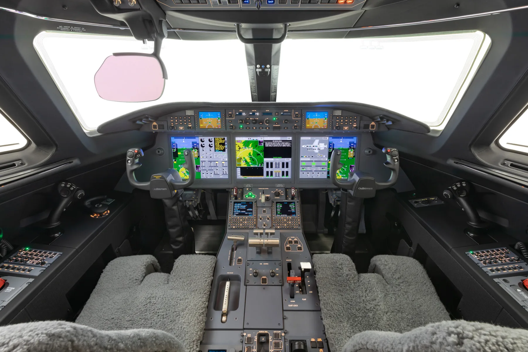 Full view of the Gulfstream cockpit with modern avionics.