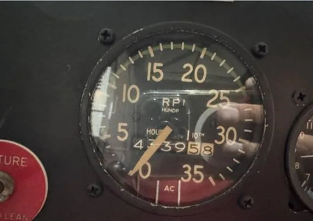 A close-up of an aircraft's tachometer and hour meter, displaying 4739.58 hours.