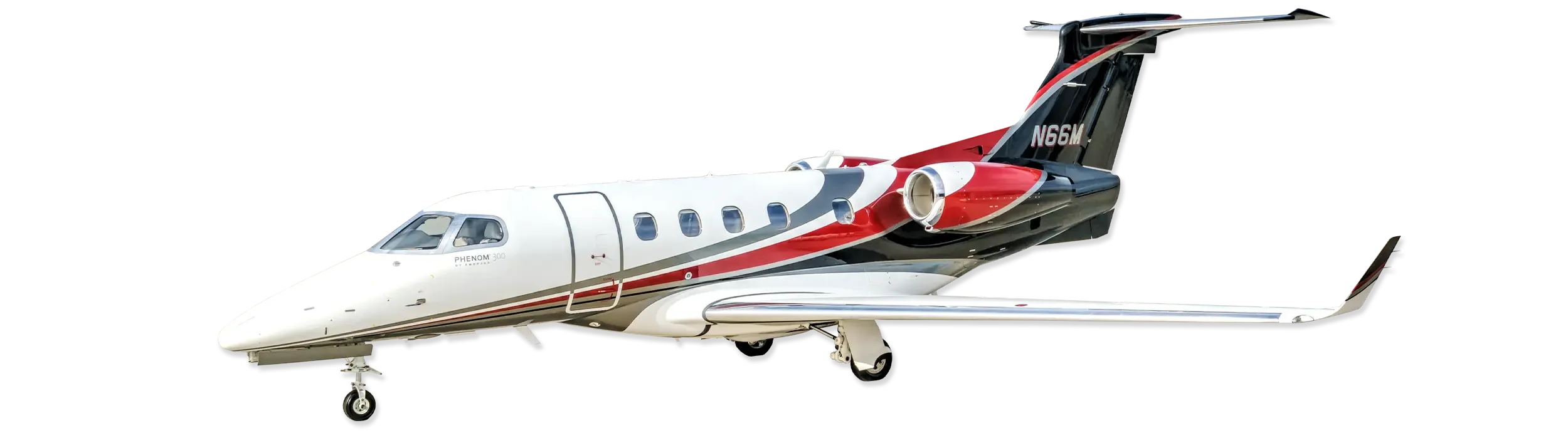 A white, red, and black Embraer Phenom 300 business jet with registration N66M on the tail.