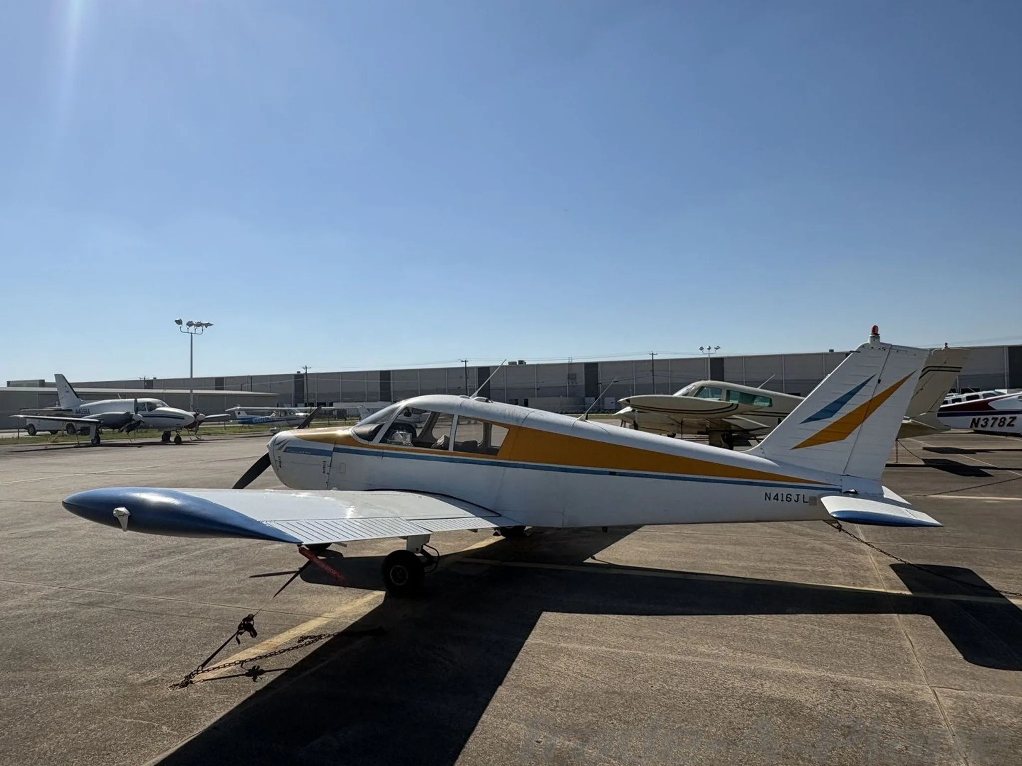 Another angle showing the aircraft parked.