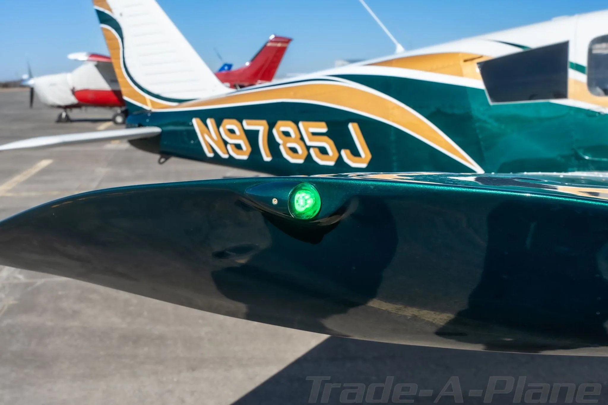 Close-up of the aircraft's green wingtip light.