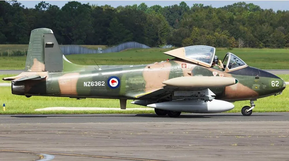 A Royal New Zealand Air Force BAC Strikemaster Mk.88 (NZ6362) in camouflage paint scheme on a taxiway.