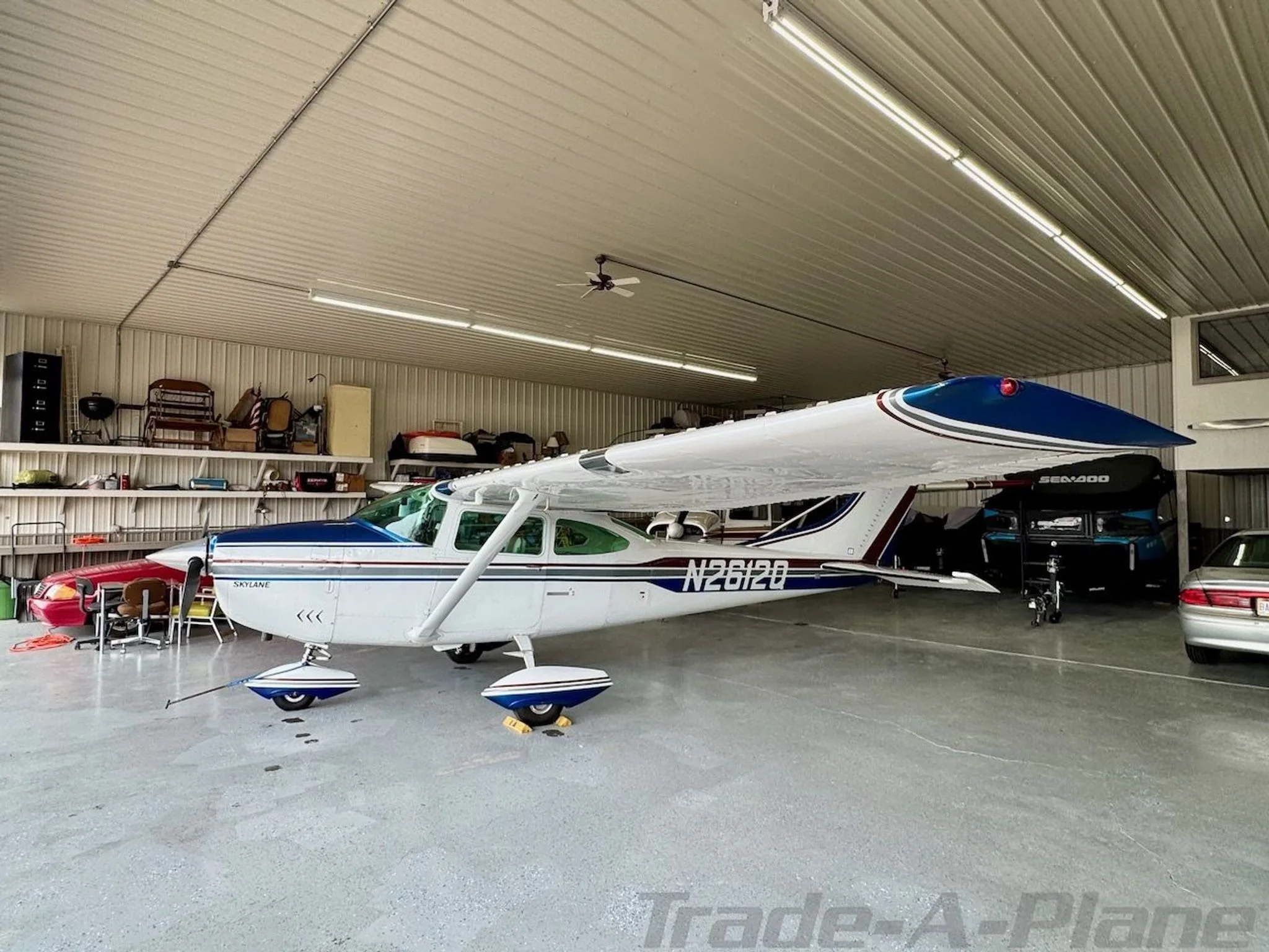A detailed view of the Cessna N2612Q cockpit with modern Garmin avionics and controls.