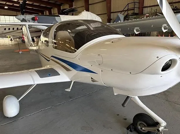 Close-up view of a Diamond DA40-180 Star in a hangar.