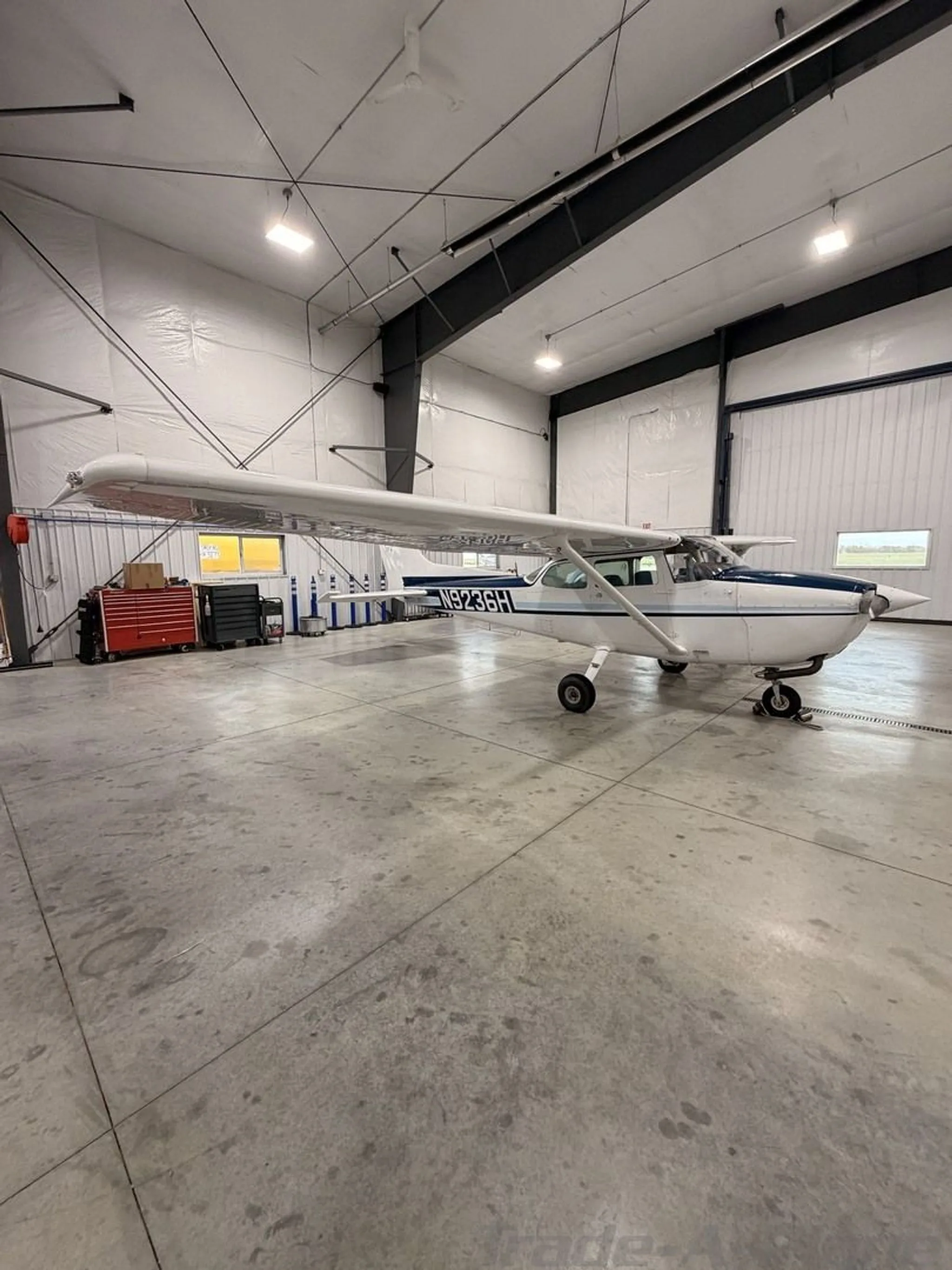 Cessna 172M Skyhawk parked in a hangar.
