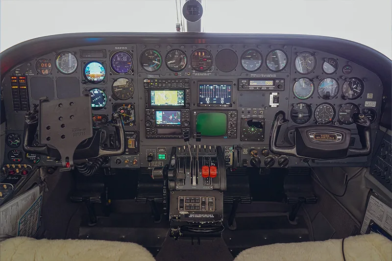 The cockpit of a Cessna 421 Golden Eagle aircraft features a full instrument panel.