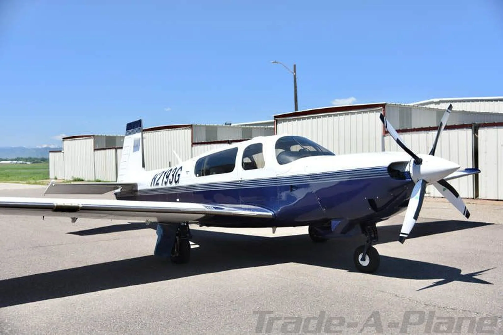 Front view of the aircraft highlighting the propeller.