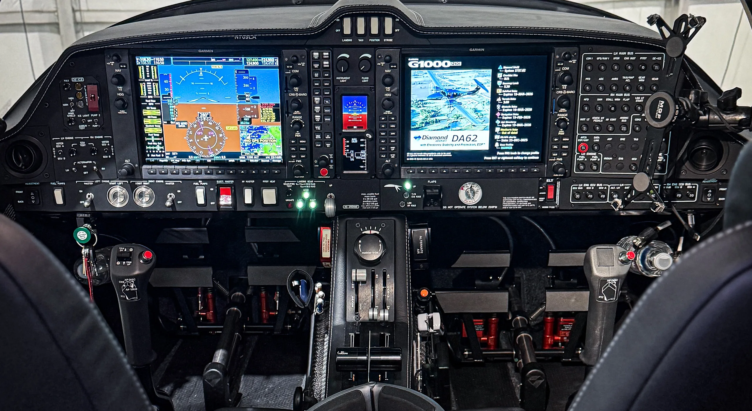 The cockpit of a Diamond DA62 aircraft, featuring a Garmin G1000 NXi integrated flight deck.