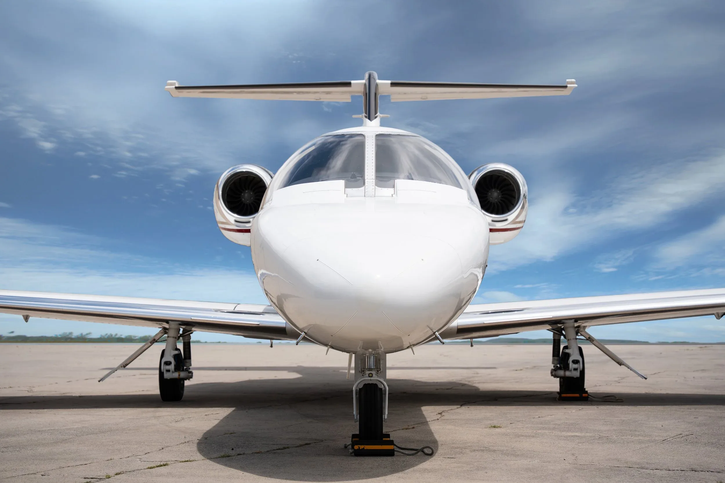 Front view of a Cessna Citation M2 aircraft on the ground.