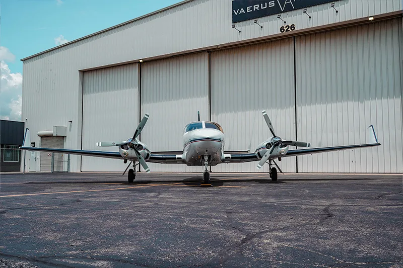 Front view of a Cessna 421 Golden Eagle aircraft parked on the tarmac.