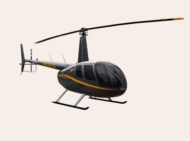 A dark gray Robinson R44 helicopter with yellow stripes and registration N9081N, viewed from the front-left.