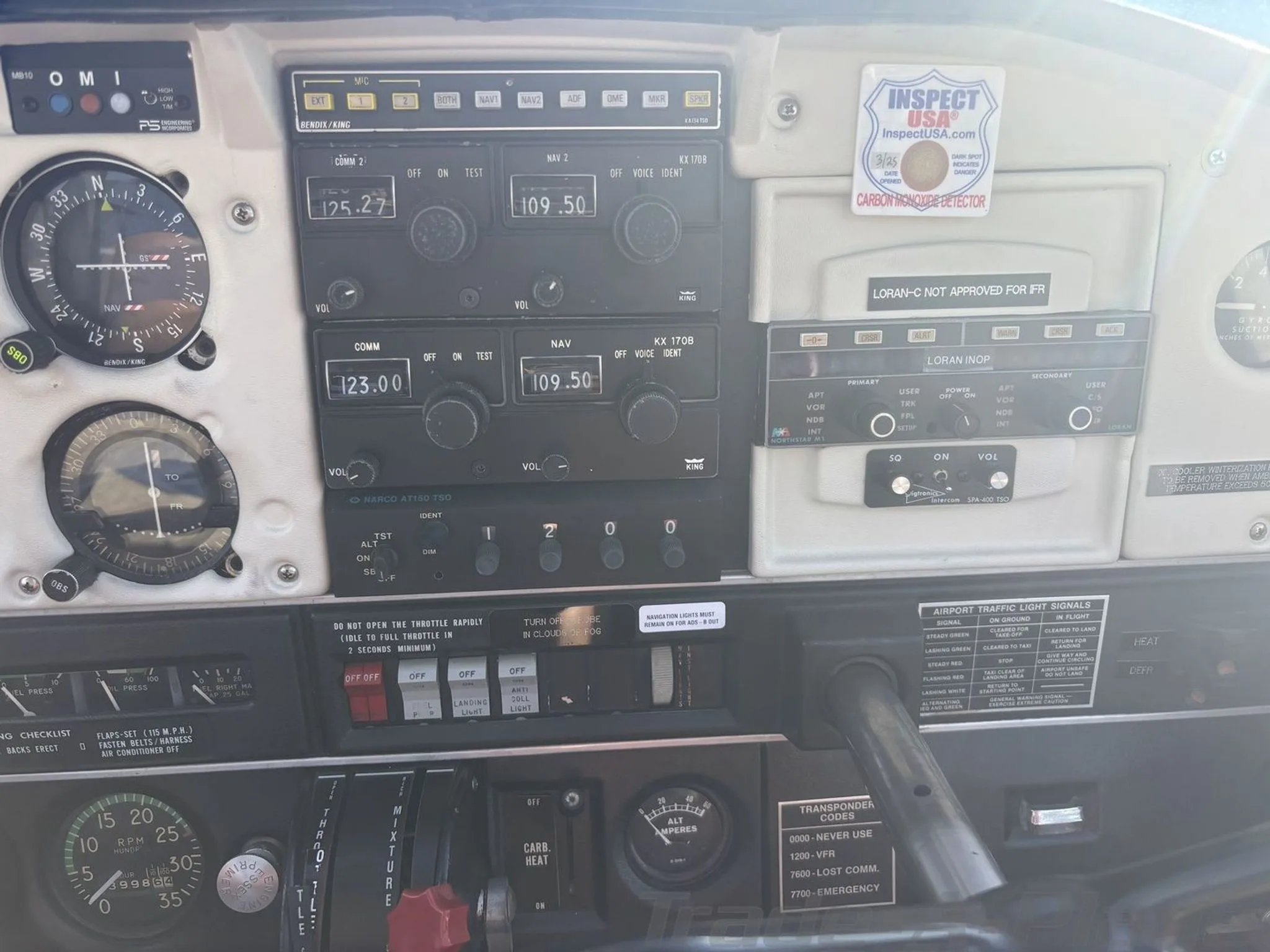 Control panel with radio and navigation instruments.