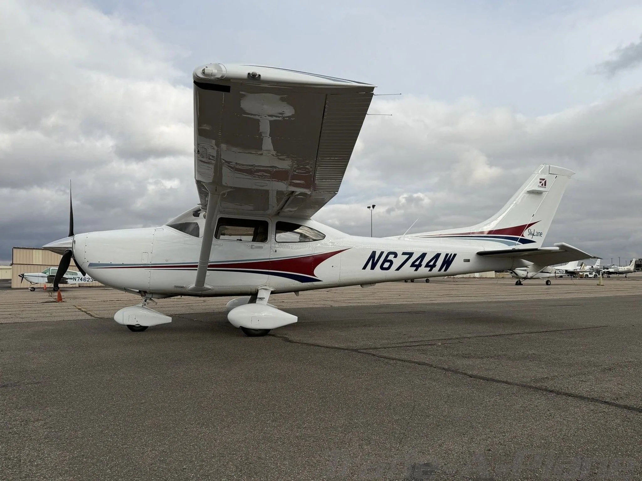 The Cessna 182T Skylane parked on the tarmac.