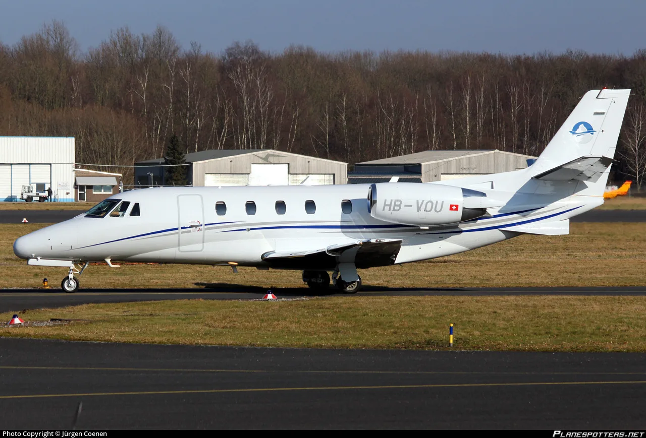 A Cessna Citation CJ1 aircraft with registration HB-VOU on the ground.