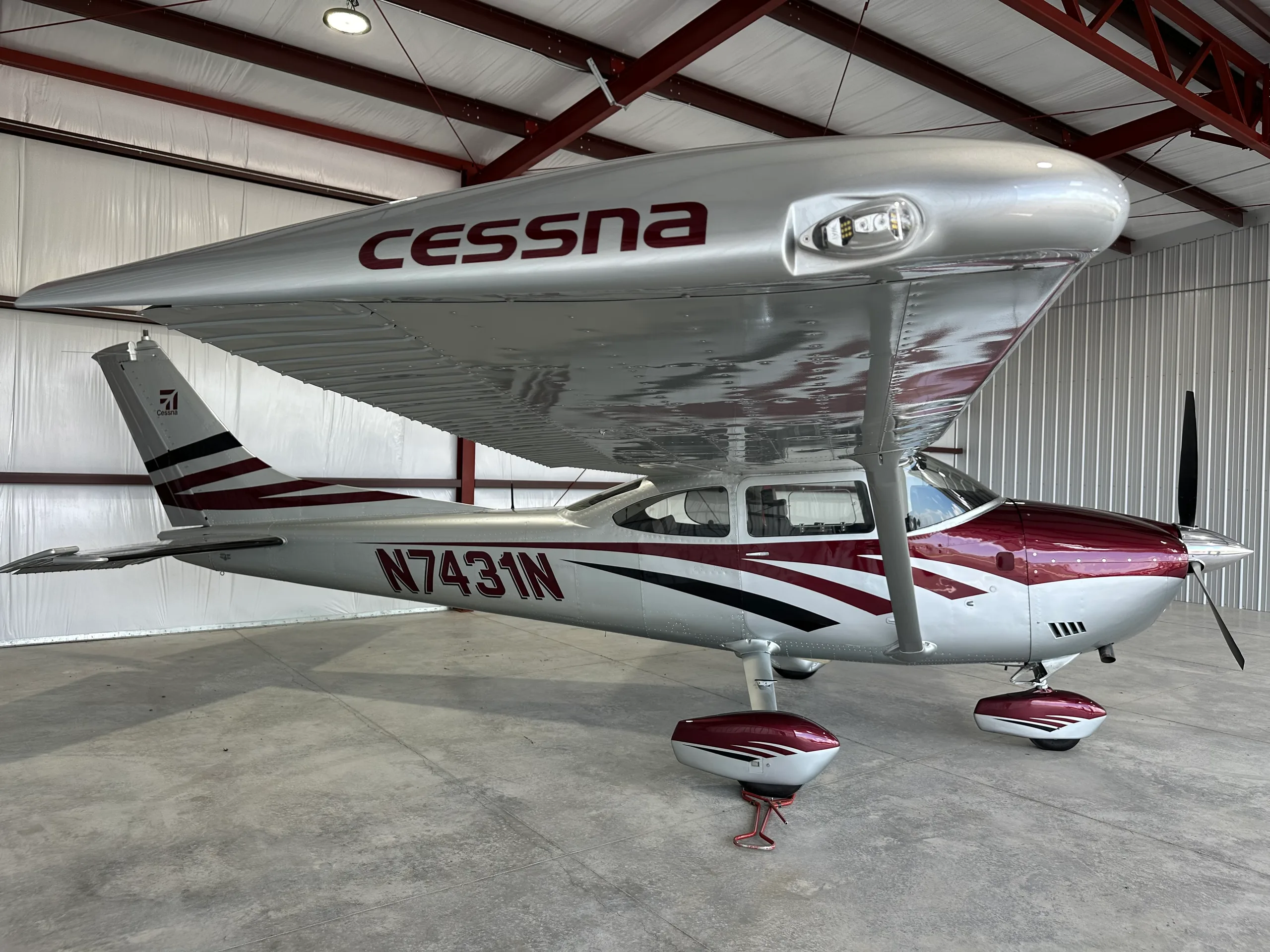 Cessna 182 Skylane N7431N parked inside a hangar.