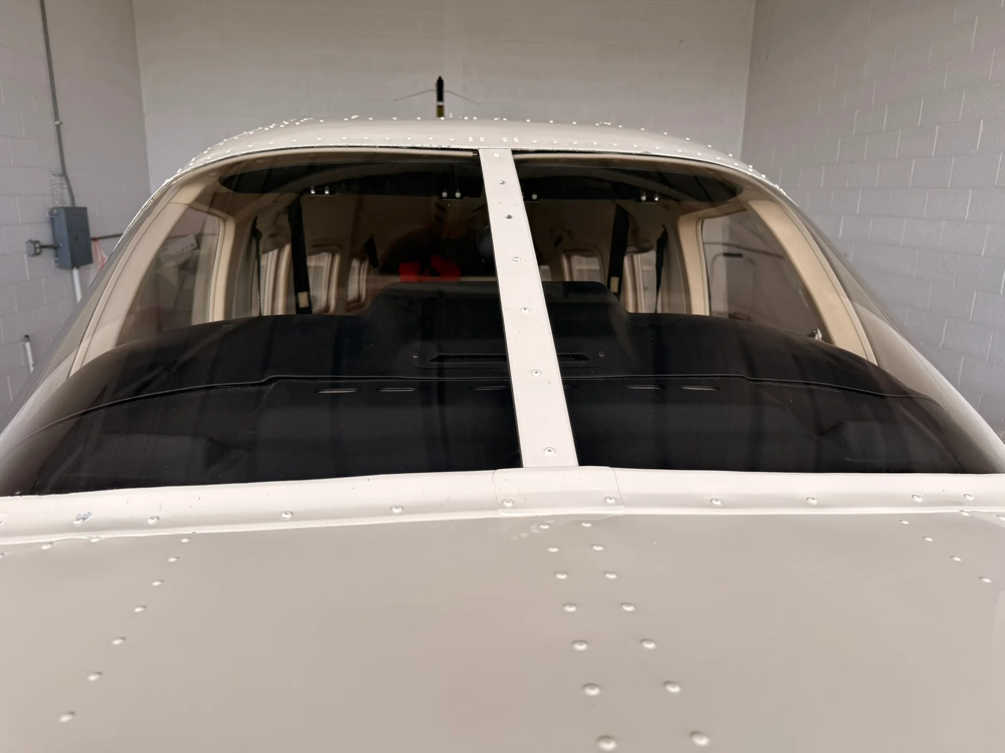 Close-up view of the front windshield of the Piper Saratoga II HP.