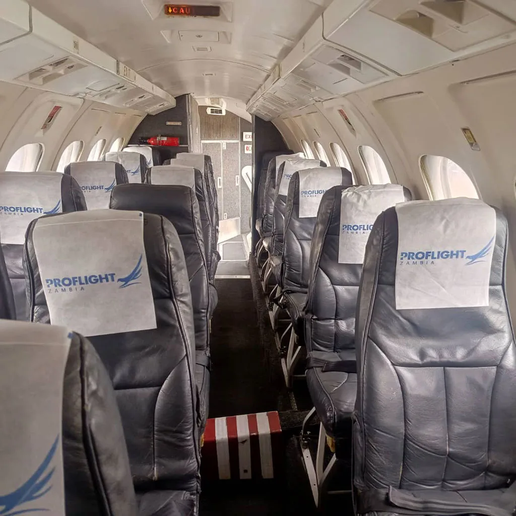 The interior cabin of the Jetstream 32 with seats.