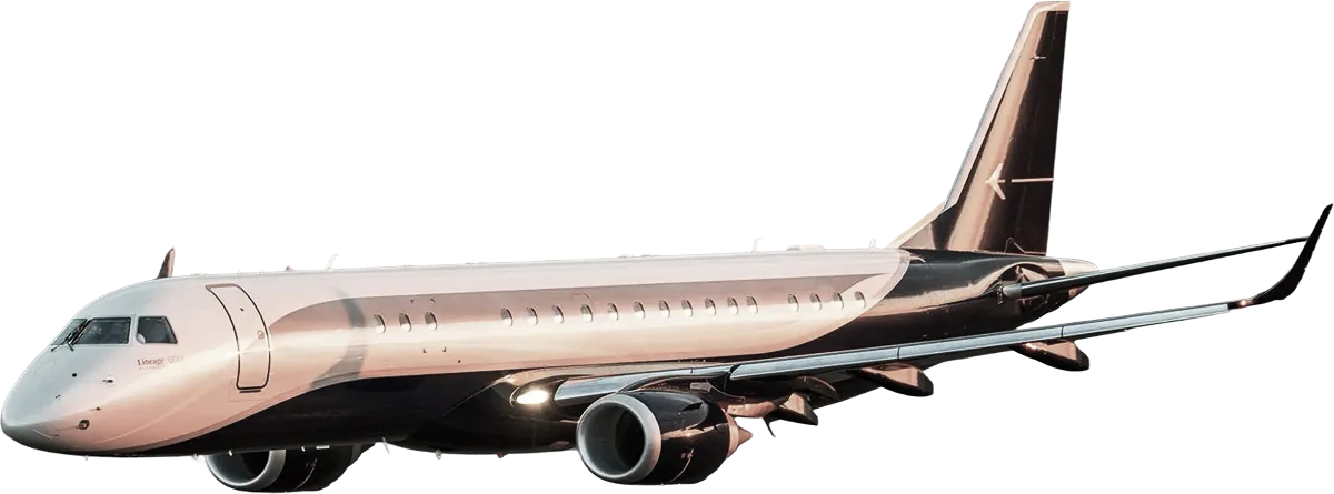 A two-tone Embraer Lineage 1000E business jet with a light metallic top and dark metallic bottom, seen from a low angle.