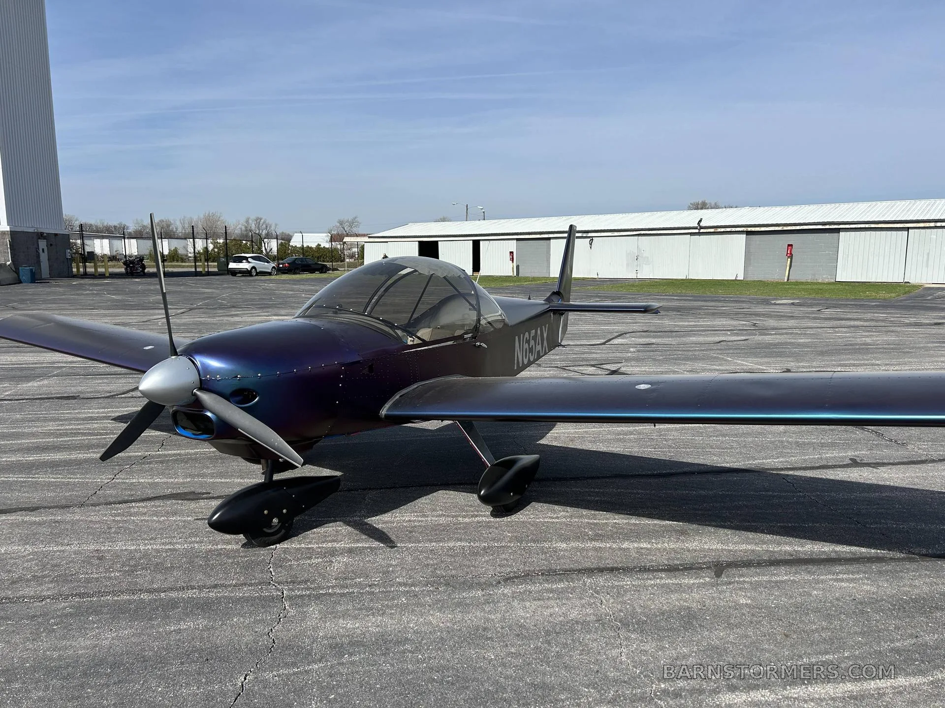 The interior of a Zenith aircraft showing two grey seats with Zenith Aircraft logos and a baggage weight limit.