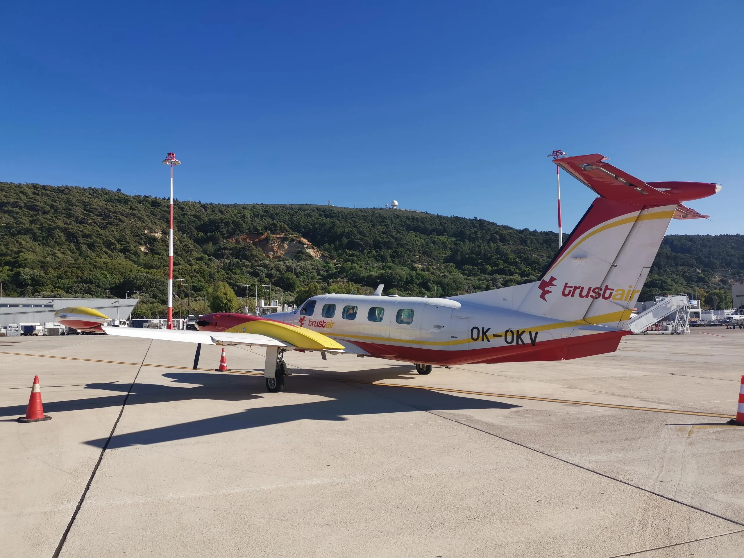 OK-OKV Cheyenne III aircraft with Trust Air livery parked on the tarmac.