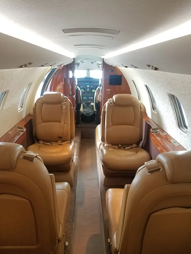 Interior view of the aircraft showing the cabin seats.
