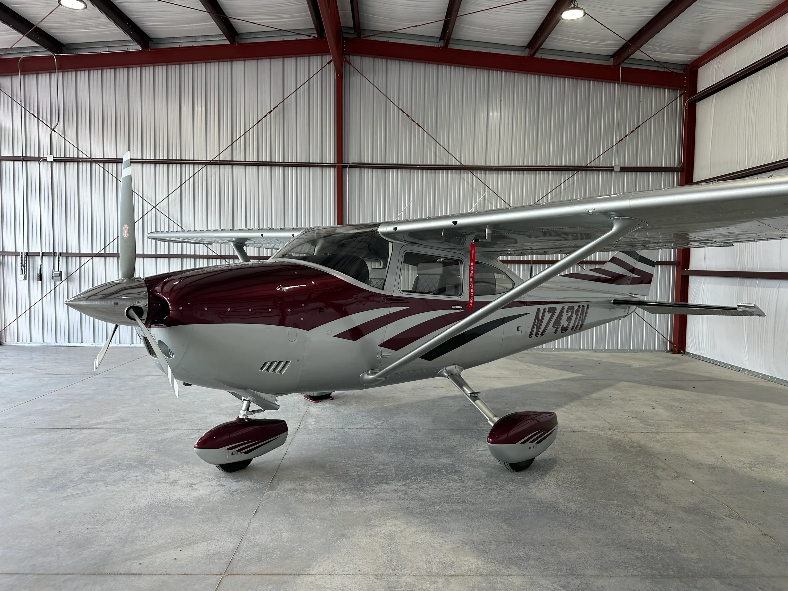 Cessna 182 Skylane N7431N parked inside a hangar.
