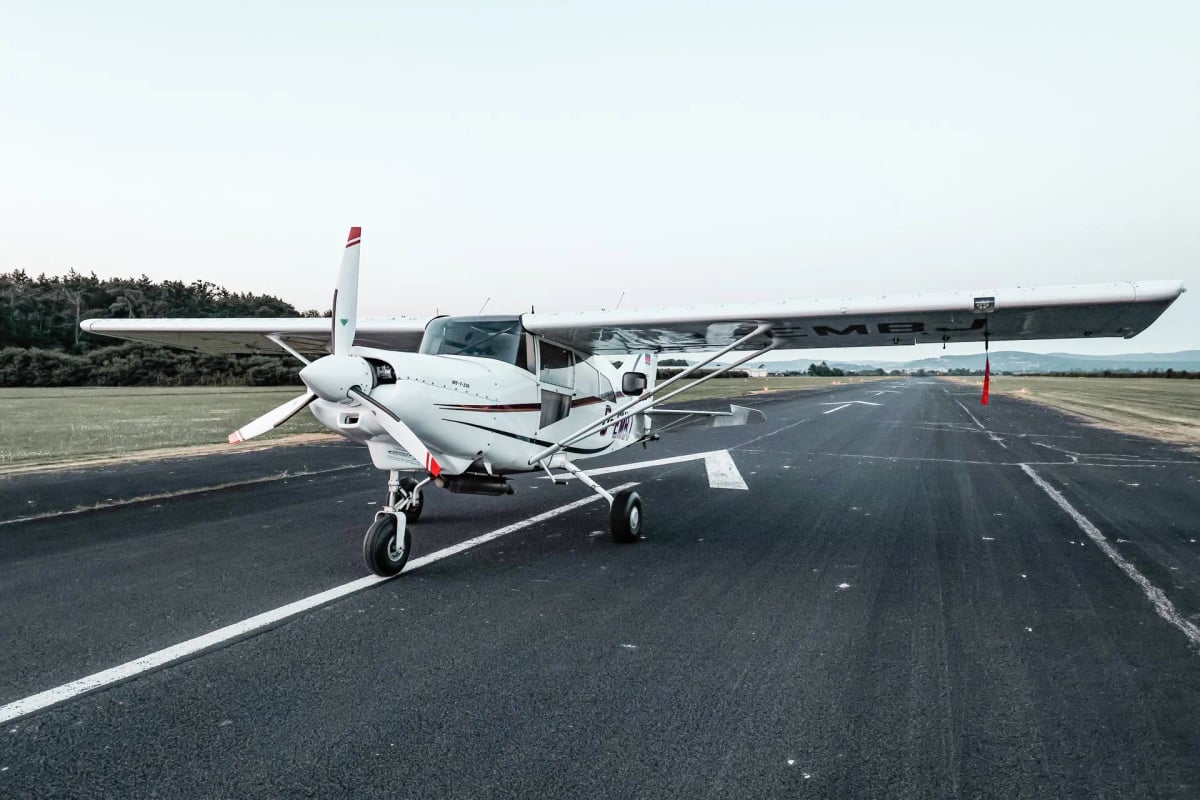 Front three-quarter view of the D-EMBJ Maule STOL aircraft on the tarmac.