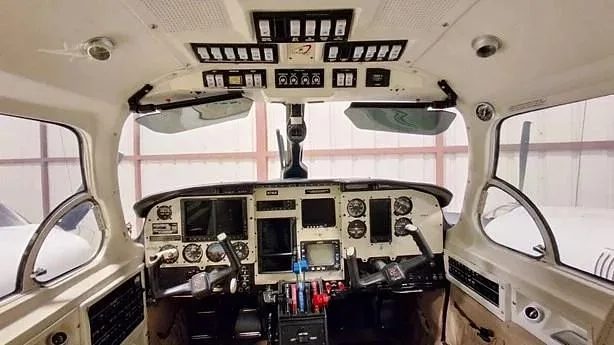 The cockpit of the Piper Navajo CR displaying the instrument panel.
