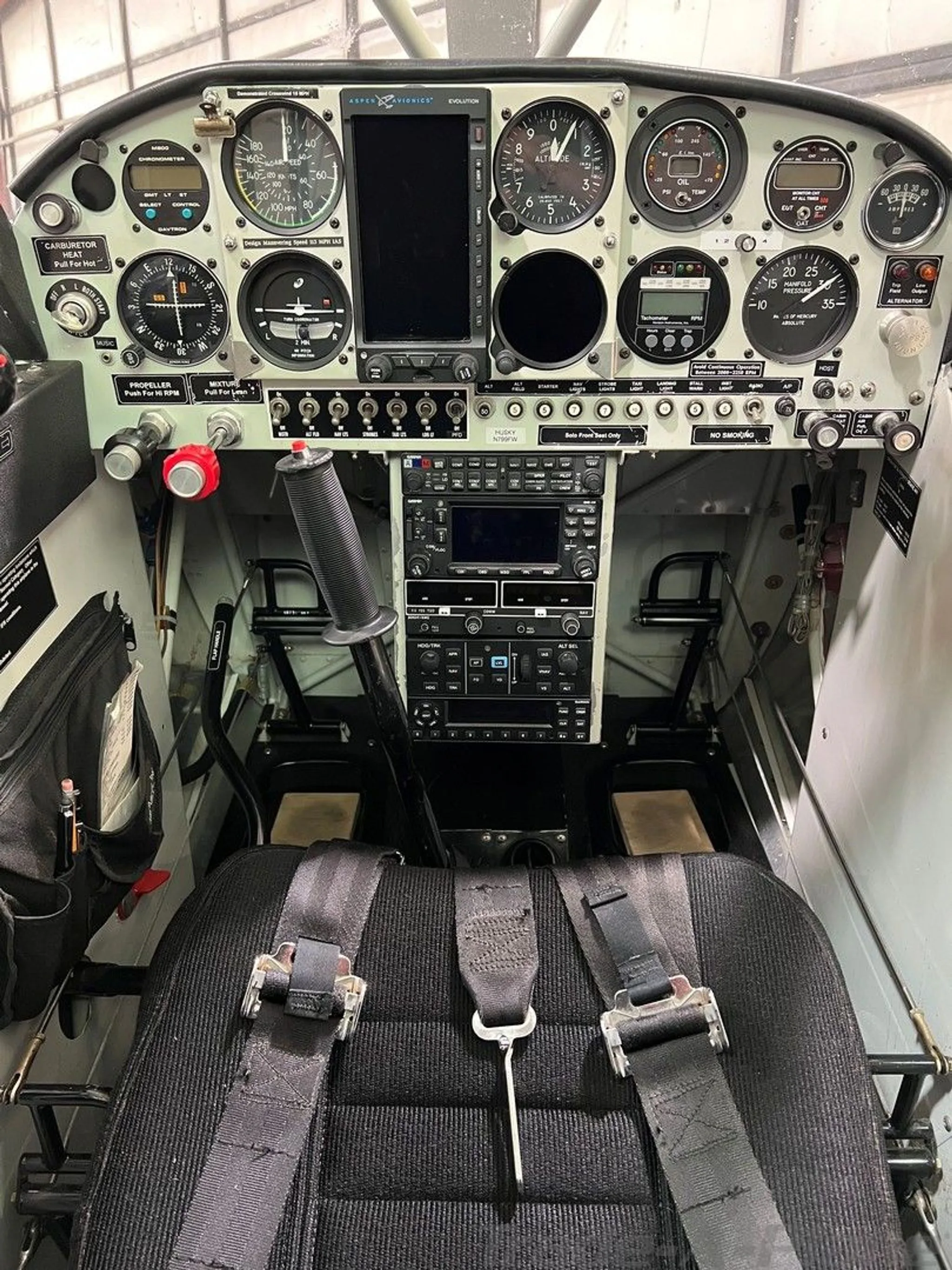 Cockpit view showing the instrument panel of the 1999 Aviat Husky A-1B.