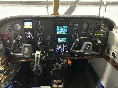The cockpit features a full instrument panel.