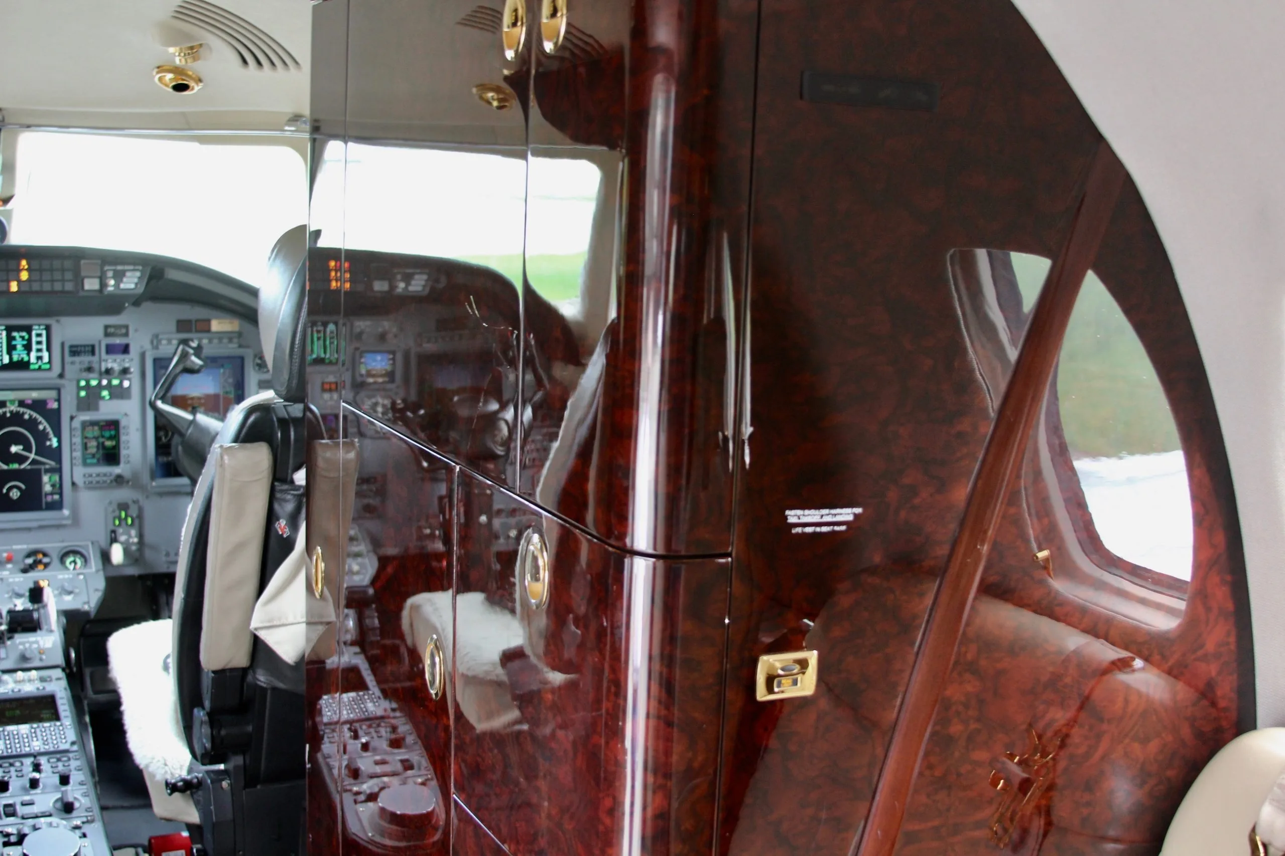 View of the cockpit and cabin entrance of the aircraft.