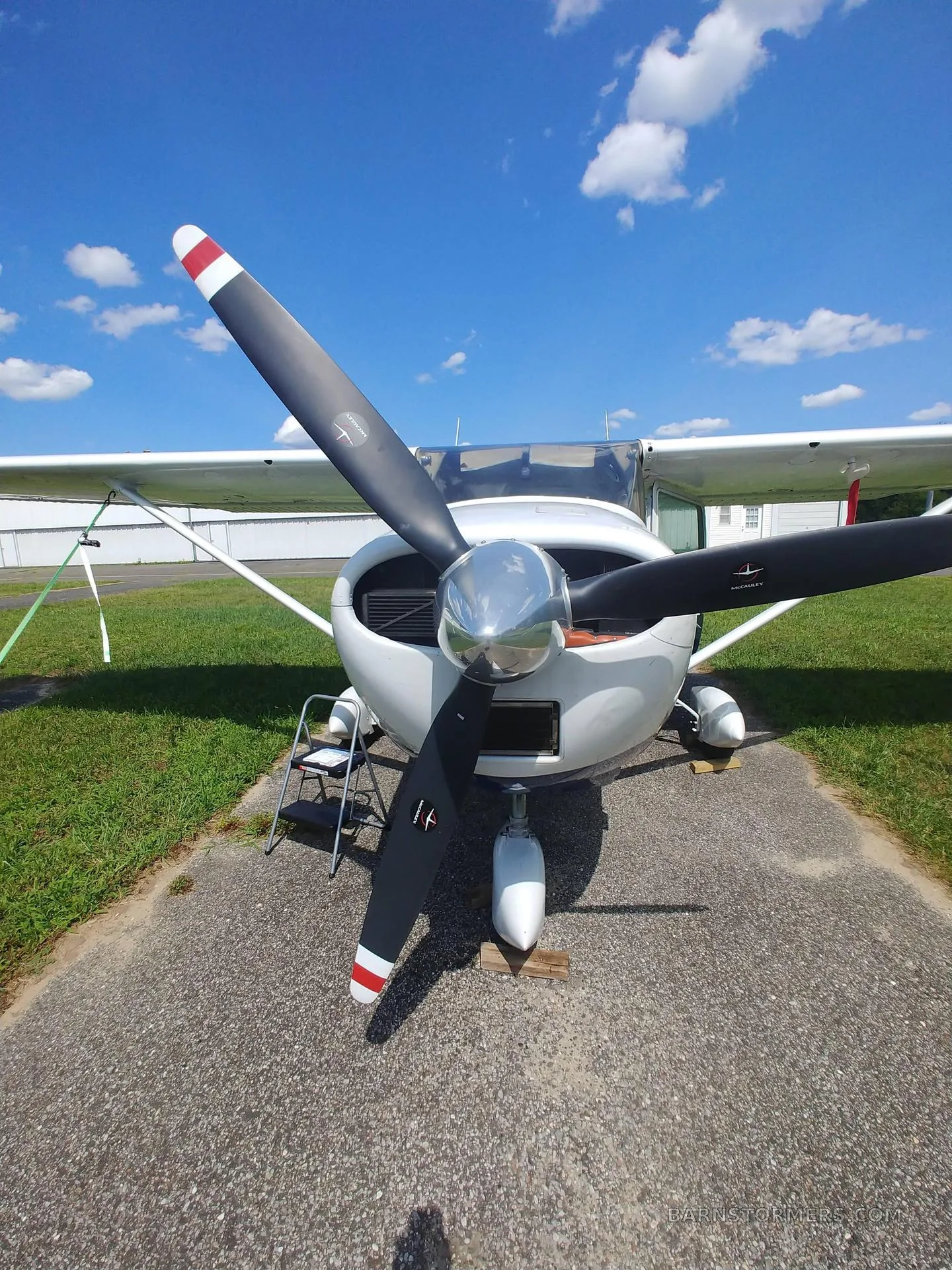 A view from the cockpit of a light aircraft (N274VF), showing the instrument panel, controls, and a runway ahead.