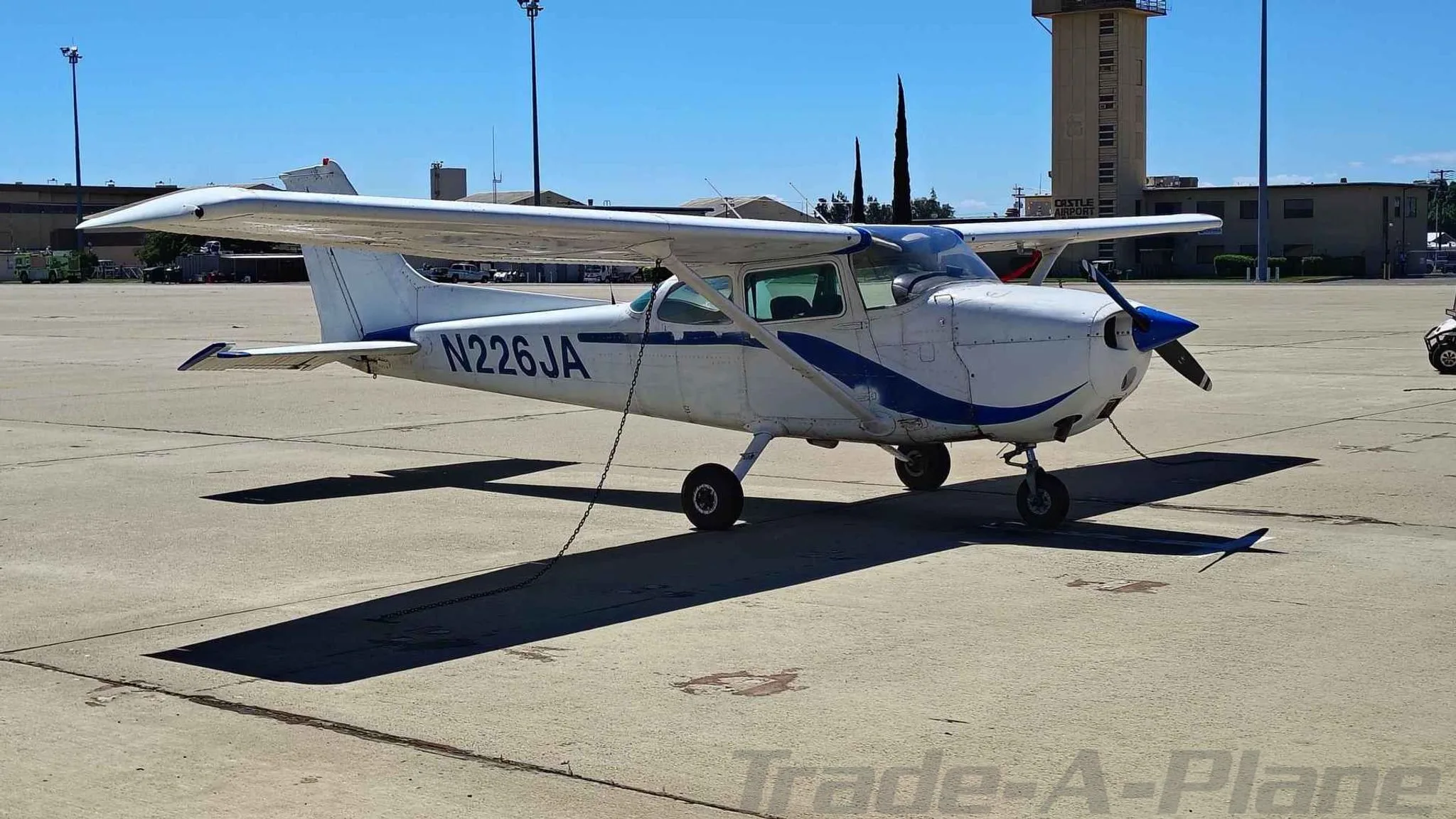 Another view of the Cessna 172M Skyhawk on the ground.