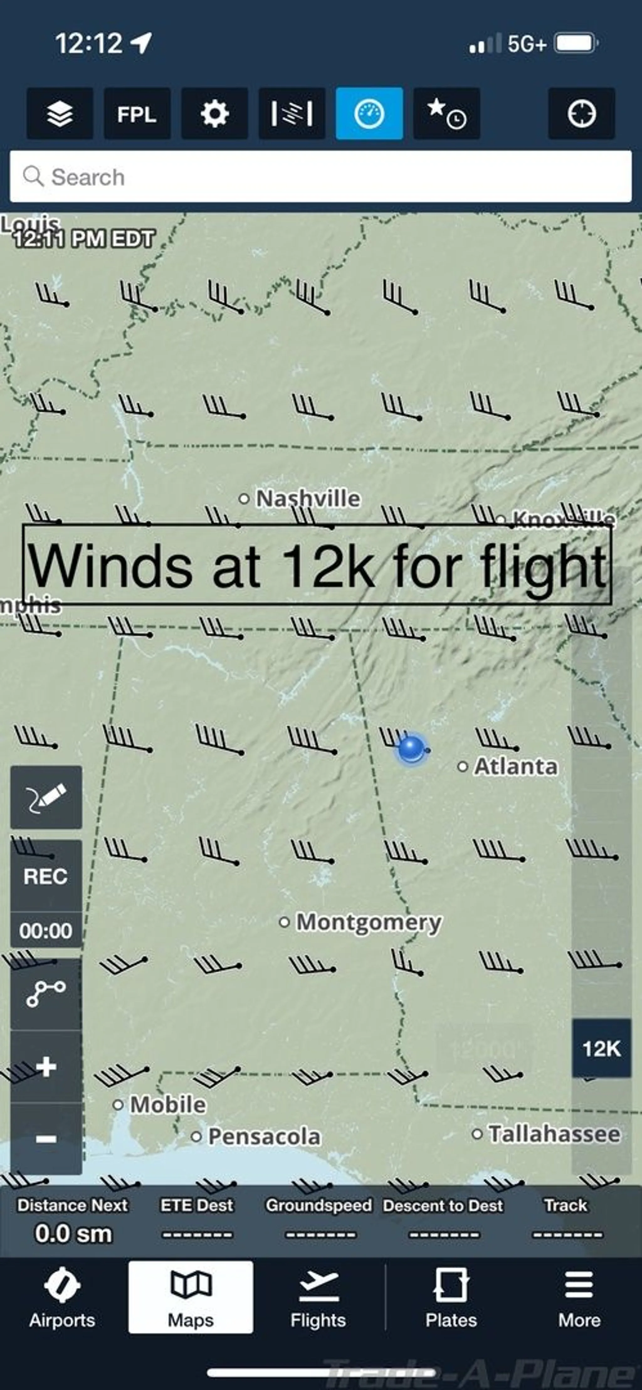 A mobile app screenshot displaying a weather map with wind barbs over the southeastern United States.
