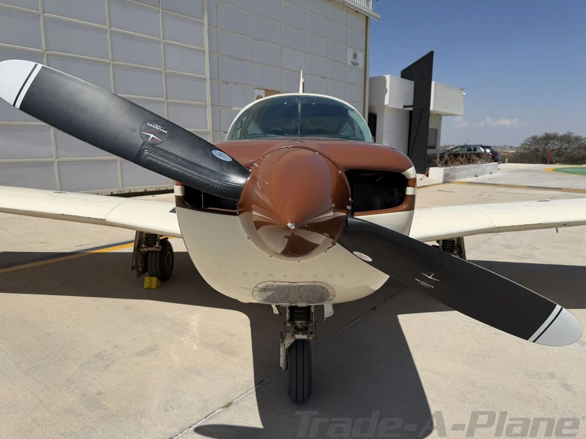 Front view of the Mooney M20K 231 showcasing its propeller.