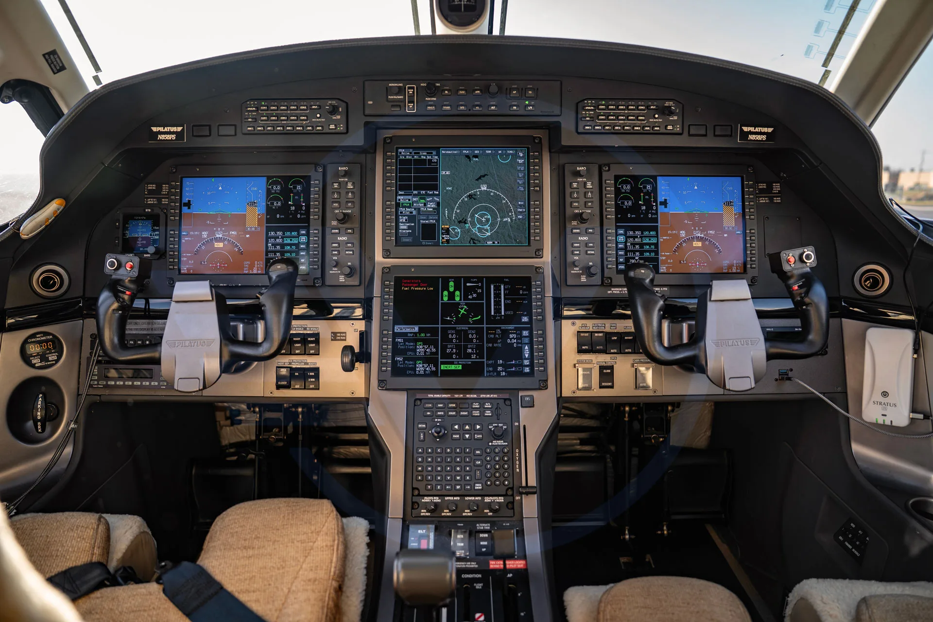 Detailed view of the Pilatus PC-12 cockpit instrument panel.